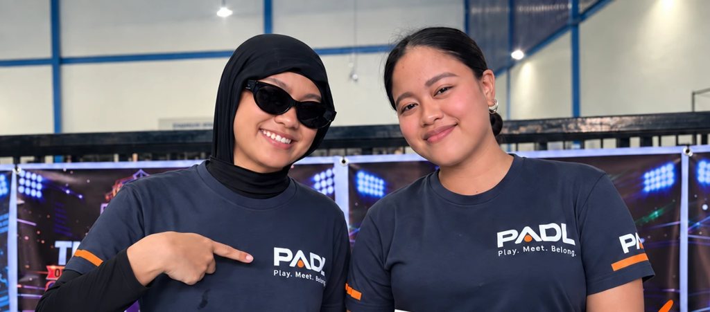 Two PADL team members in PADL shirts at a tournament